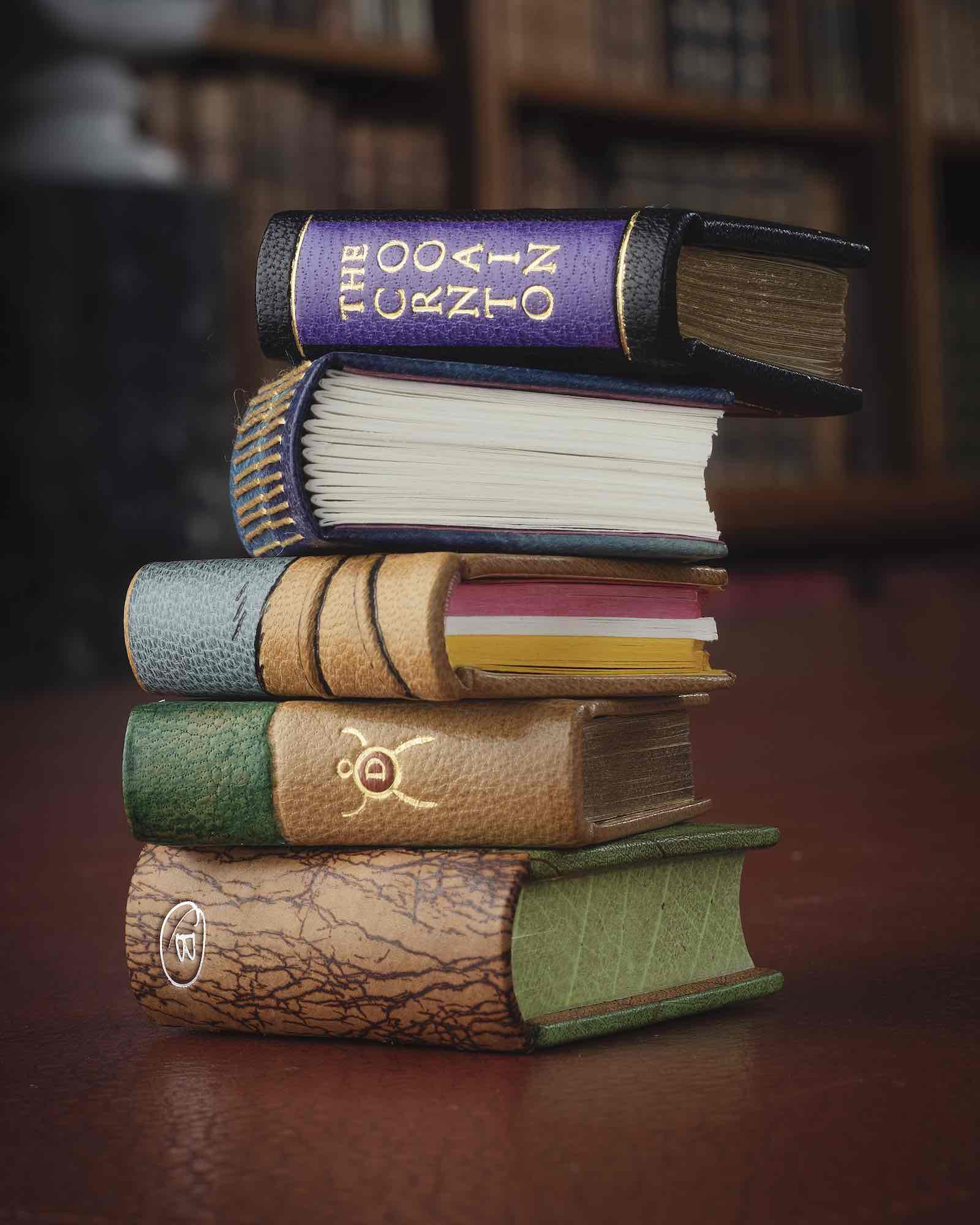 The new miniature books in the Royal Library. These books are now on display for  visitors to Windsor Castle and can be seen alongside Queen Mary’s Dolls’ House  throughout 2024.