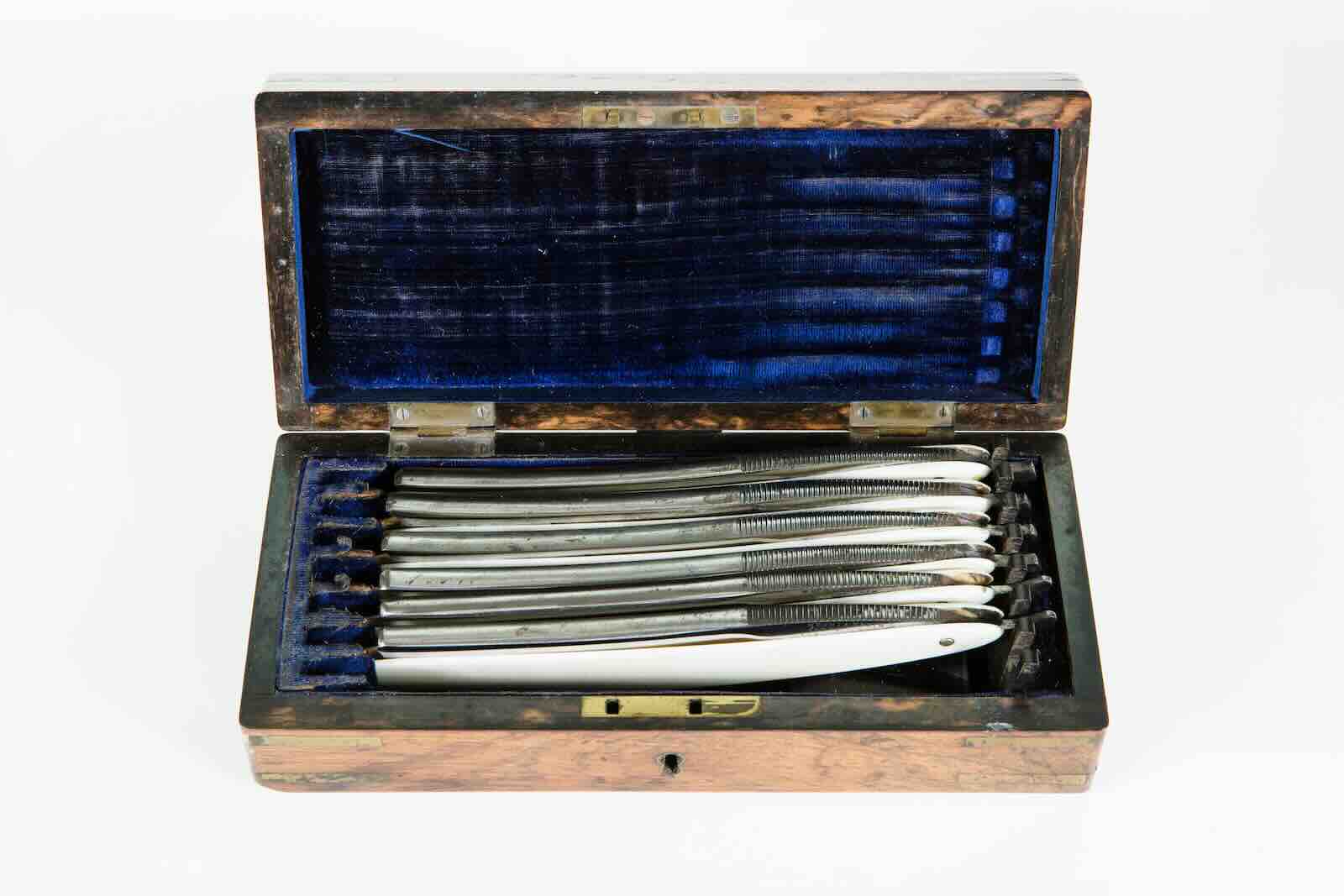 Six silver razors with ivory handles